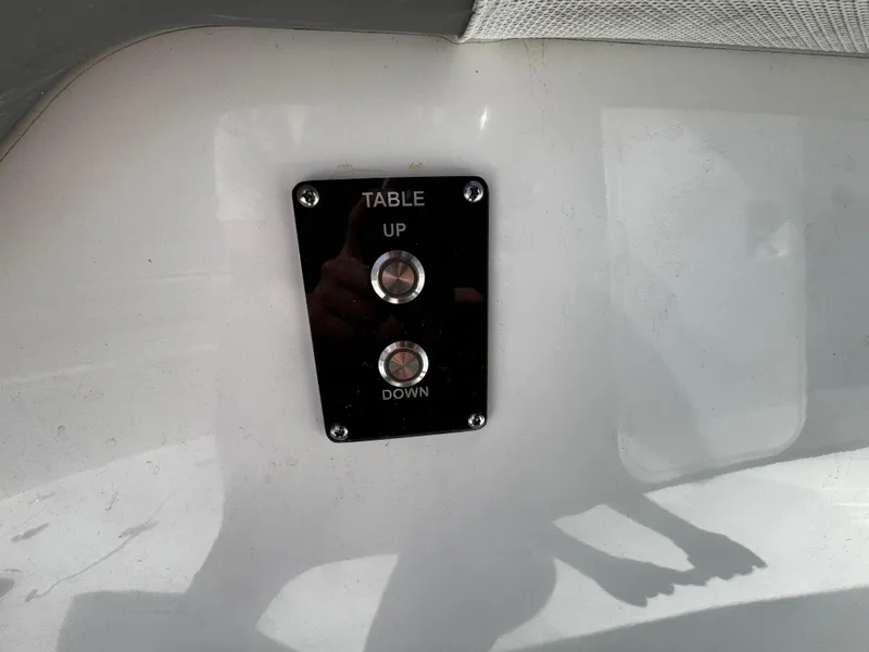 Slide: The Image of Control panel for table adjustment on 2023 Sea Pro 320 DLX Center Console boat. - 6