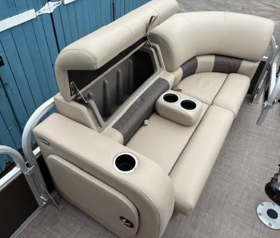 Slide: The Image of 2022 Sun Tracker SportFish 22 XP3 boat seating with storage and cup holders. - 13