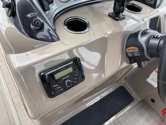 Slide: The Image of Control panel of 2022 Sun Tracker SportFish 22 XP3 boat with stereo system. - 21