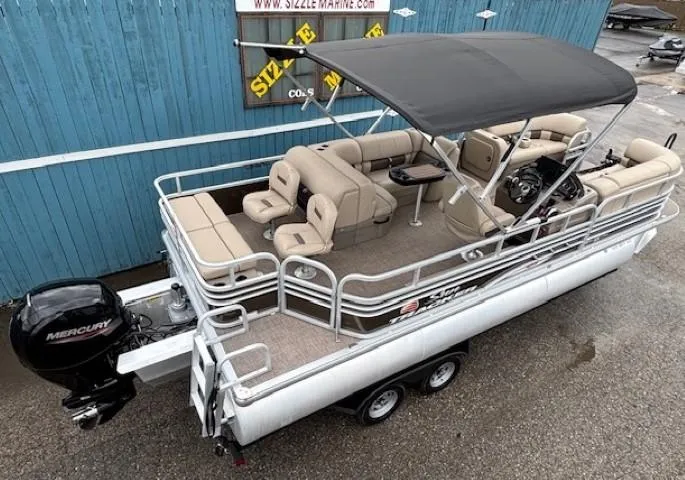 Slide: The Image of 2022 Sun Tracker SportFish 22 XP3 pontoon boat with Mercury outboard motor and canopy. - 5