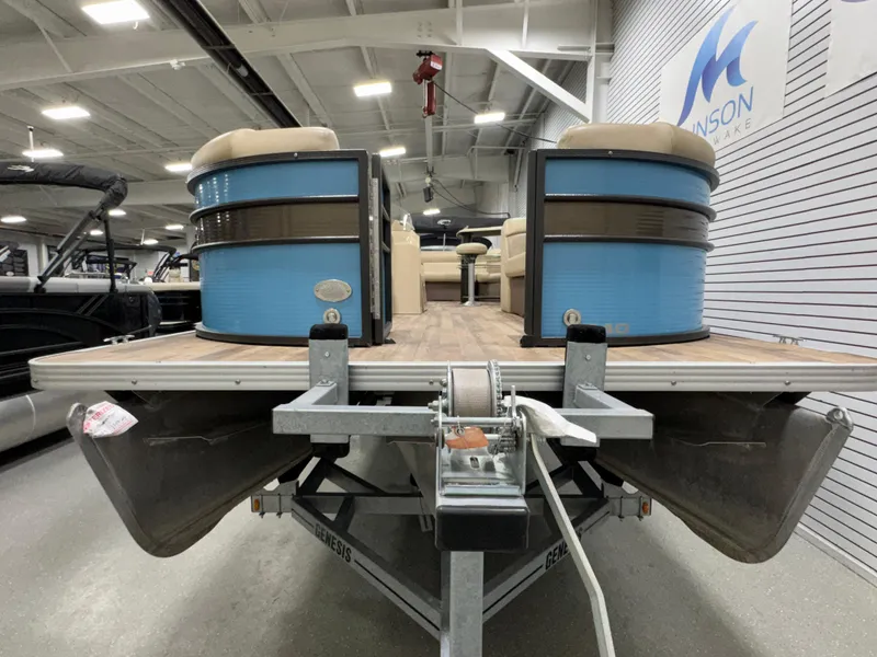 Slide: The Image of 2019 Crest III 240 SLE pontoon boat on trailer in showroom. - 21