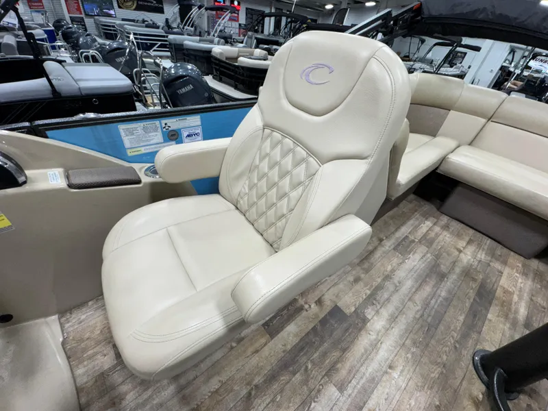 Slide: The Image of Luxurious 2019 Crest III 240 SLE boat seat with diamond-stitched upholstery in showroom. - 31