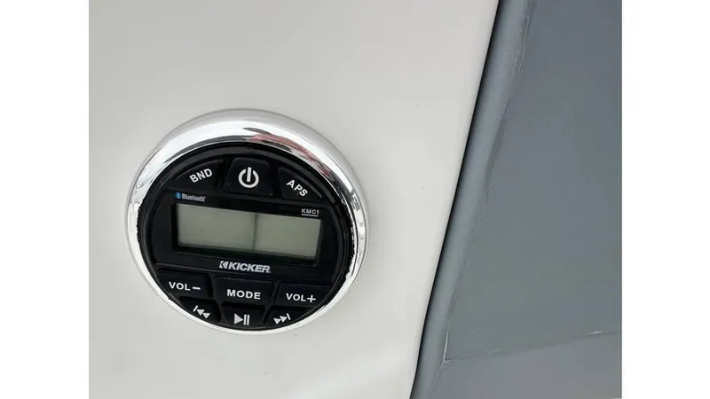 Slide: The Image of 2022 Tahoe T16 audio control panel with Kicker stereo system. - 11