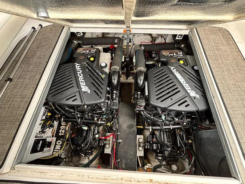 Slide: The Image of 2004 Chaparral 350 Signature engine compartment with dual Mercury engines. - 22