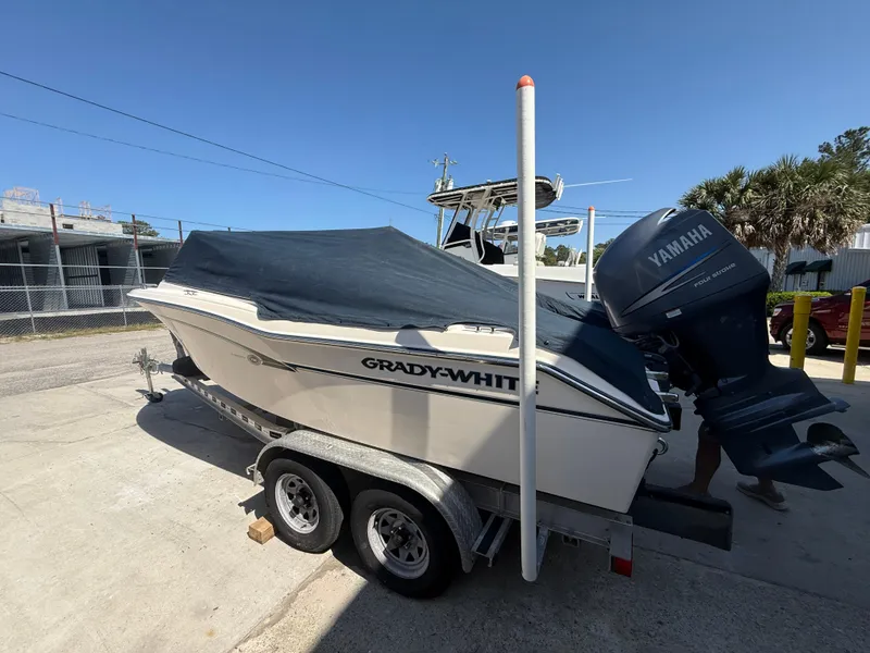 Slide: The Image of 2011 Grady-White Freedom 192 boat on trailer with Yamaha outboard motor. - 10