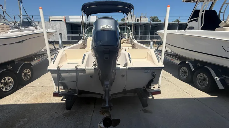 Slide: The Image of 2011 Grady-White Freedom 192 boat with Yamaha 150 engine, parked on a trailer. - 14