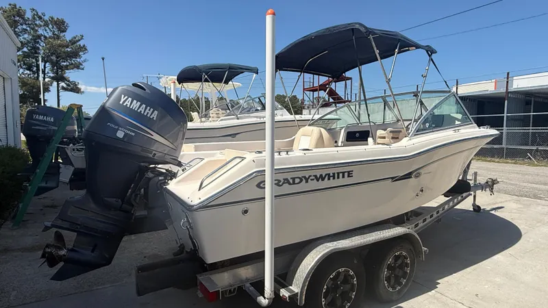 Slide: The Image of 2011 Grady-White Freedom 192 boat with Yamaha engine on a trailer. - 16