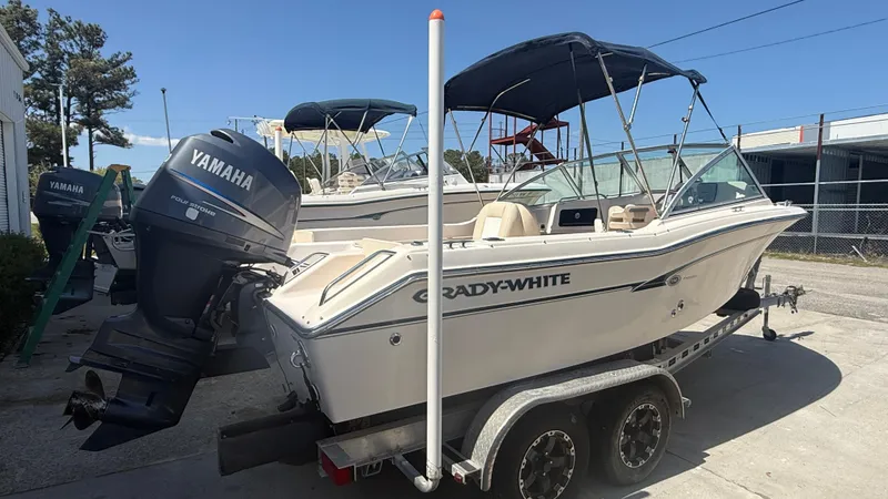 Slide: The Image of 2011 Grady-White Freedom 192 boat on trailer with Yamaha outboard motor. - 2