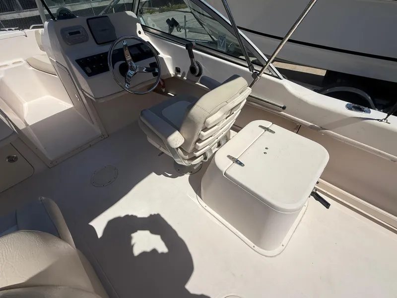 Slide: The Image of 2011 Grady-White Freedom 192 boat interior with helm and seating area. - 29