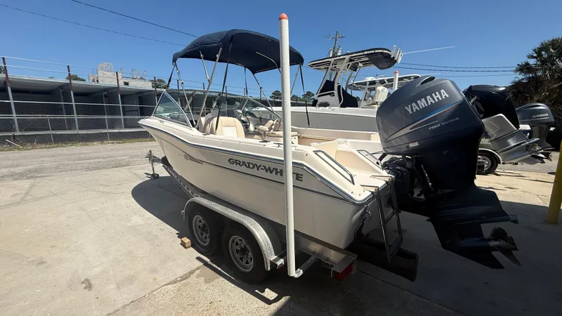 Slide: The Image of 2011 Grady-White Freedom 192 boat with Yamaha outboard motor on trailer. - 3