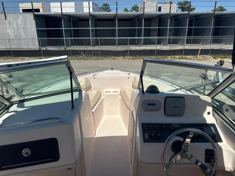 Slide: The Image of 2011 Grady-White Freedom 192 boat interior with steering wheel and dashboard. - 49