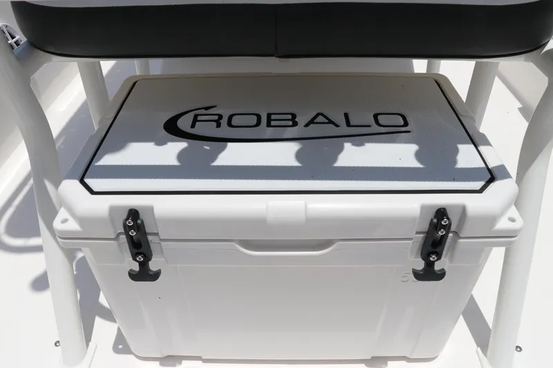 Slide: The Image of 2025 Robalo 206 Cayman boat cooler with logo under seat. - 11