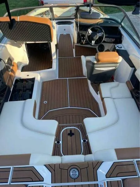 Slide: The Image of 2017 Correct Craft Super Air Nautique GS interior with sleek seating and modern dashboard design. - 10