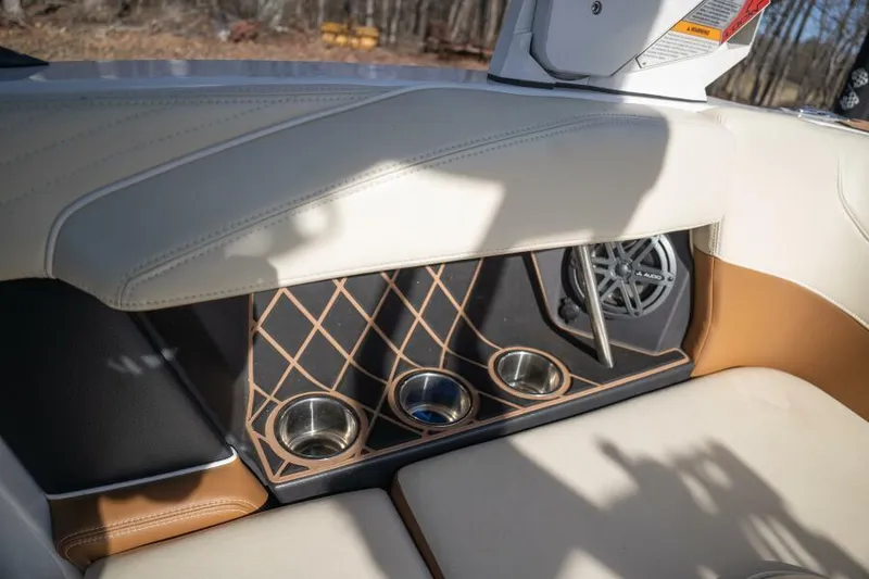 Slide: The Image of Interior of 2017 Correct Craft Super Air Nautique GS with cup holders and speaker. - 13