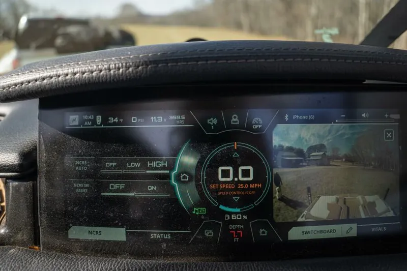 Slide: The Image of Dashboard of a 2017 Correct Craft Super Air Nautique GS boat displaying speed and settings. - 14