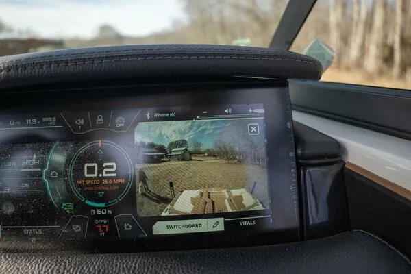 Slide: The Image of Dashboard of 2017 Correct Craft Super Air Nautique GS with digital display and rearview camera. - 15