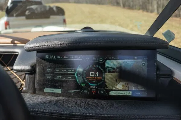 Slide: The Image of Dashboard of 2017 Correct Craft Super Air Nautique GS with digital display and controls. - 22