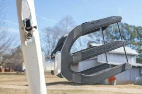 Slide: The Image of 2017 Correct Craft Super Air Nautique GS wakeboard rack in outdoor setting. - 33