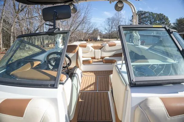 Slide: The Image of Interior of 2017 Correct Craft Super Air Nautique GS boat with tan and white seating. - 44