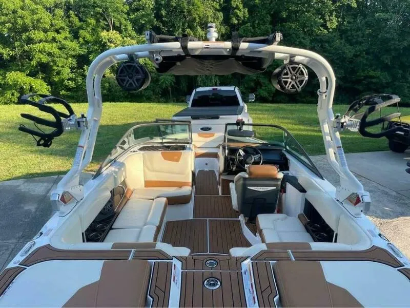 Slide: The Image of 2017 Correct Craft Super Air Nautique GS boat with spacious seating and modern design. - 7