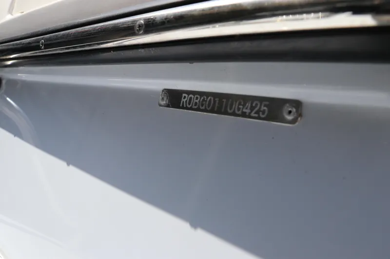Slide: The Image of 2025 Robalo 226 Cayman boat hull identification number plate. - 41