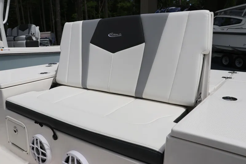 Slide: The Image of 2025 Robalo 226 Cayman boat seat with stylish black and white upholstery. - 8