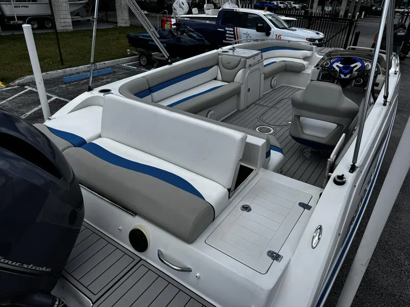 Slide: The Image of 2020 Starcraft MDX 211 OB boat interior with seating and steering console. - 15