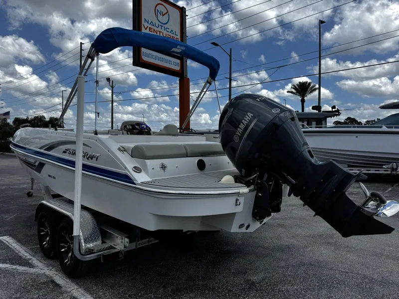 Slide: The Image of 2020 Starcraft MDX 211 OB boat with Yamaha outboard motor on trailer. - 2