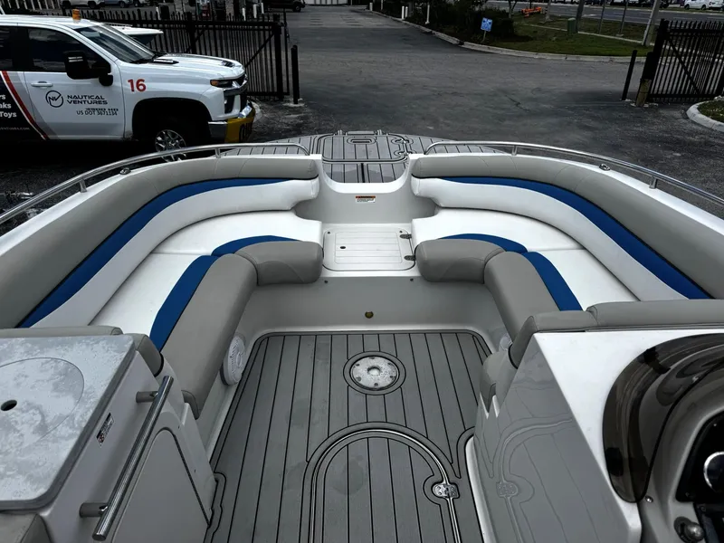 Slide: The Image of 2020 Starcraft MDX 211 OB boat interior with seating and deck view. - 6