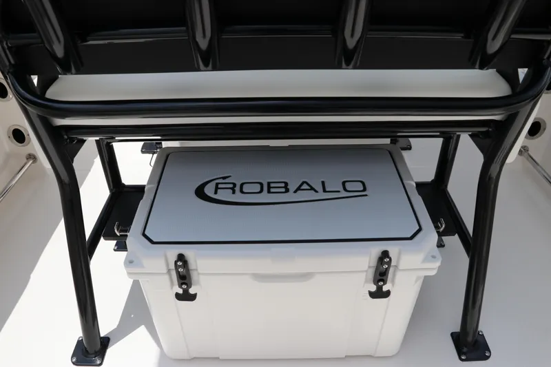 Slide: The Image of 2024 Robalo R230 Center Console cooler storage under seat. - 11