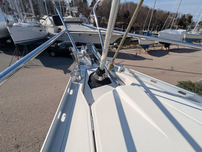 Slide: The Image of Deck view of a 1996 Jeanneau 45.1 sailboat, showcasing sleek design and rigging details. - 19