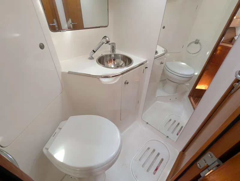 Slide: The Image of Bathroom interior of 1996 Jeanneau 45.1 yacht with sink and toilet. - 38