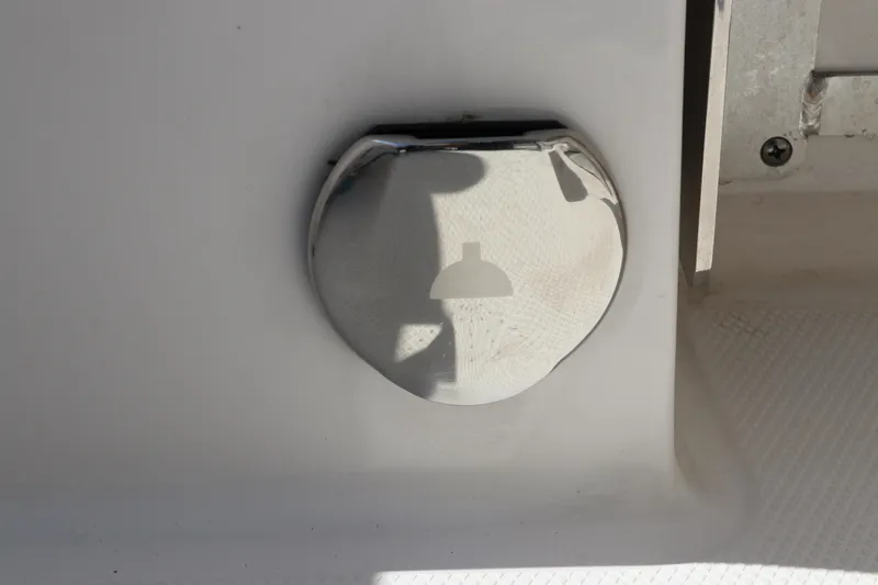 Slide: The Image of Chrome detail on 2024 Robalo R230 Center Console boat. - 10