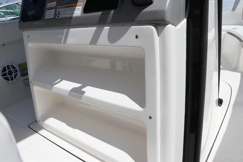 Slide: The Image of 2024 Robalo R230 Center Console boat interior storage compartment. - 21