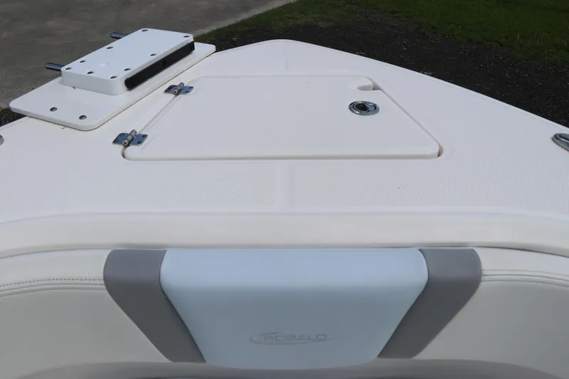 Slide: The Image of 2024 Robalo R230 Center Console boat deck with storage compartment. - 40