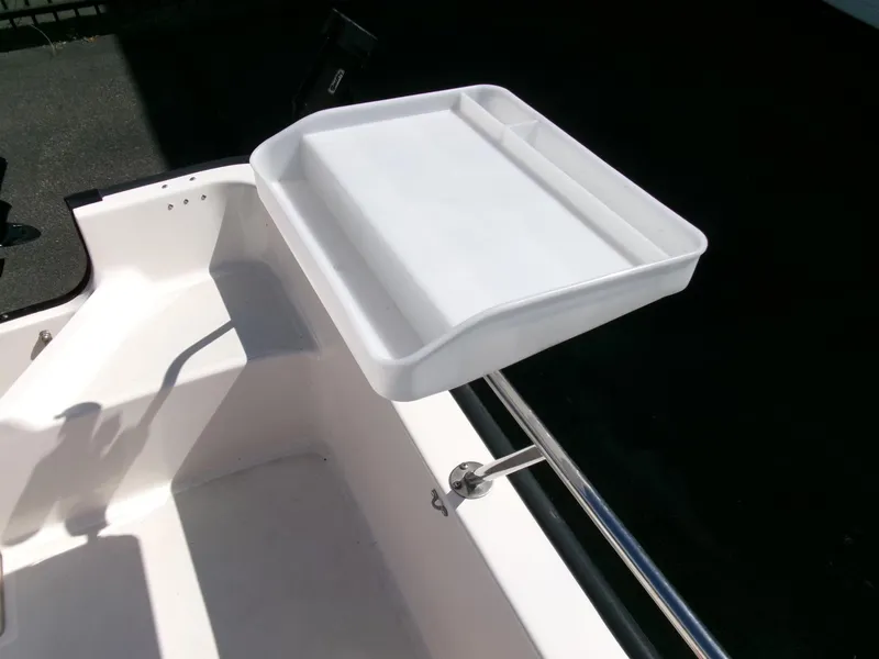 Slide: The Image of 2003 Boston Whaler 170 Montauk boat with mounted white tray accessory. - 18