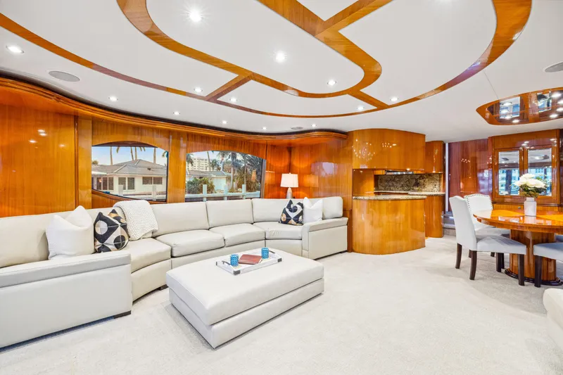 Slide: The Image of Luxurious interior of 2005 Hatteras 80 Motor Yacht with elegant seating and modern decor. - 27