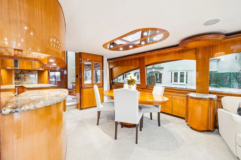 Slide: The Image of Luxurious interior of 2005 Hatteras 80 Motor Yacht with elegant wood finishes and modern furnishings. - 31