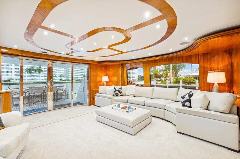 Slide: The Image of Luxurious interior of 2005 Hatteras 80 Motor Yacht with elegant seating and modern decor. - 32