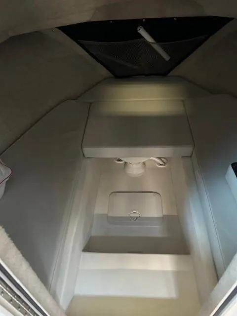 Slide: The Image of 2022 Parker 2520 XLD Sport Cabin interior with compact sleeping area. - 12