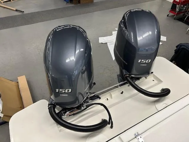 Slide: The Image of Twin Yamaha 150 outboard motors on a 2022 Parker 2520 XLD Sport Cabin boat. - 20