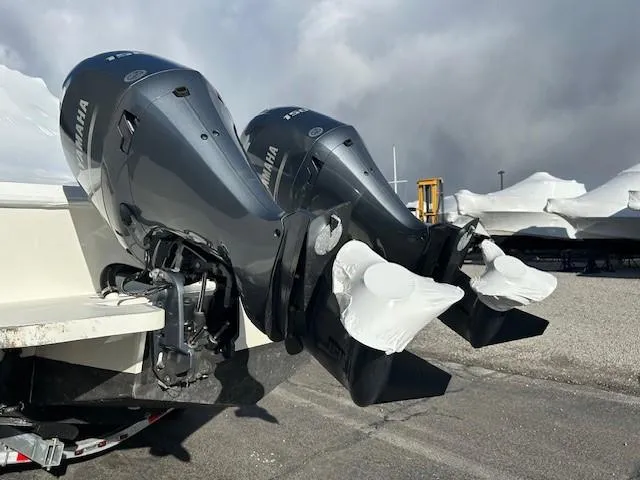 Slide: The Image of Twin Yamaha outboard motors on a 2022 Parker 2520 XLD Sport Cabin boat. - 23