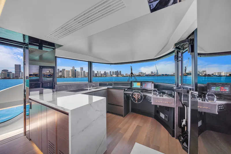 Slide: The Image of Luxurious interior of 2021 Explorer 62 yacht with panoramic city skyline views. - 23