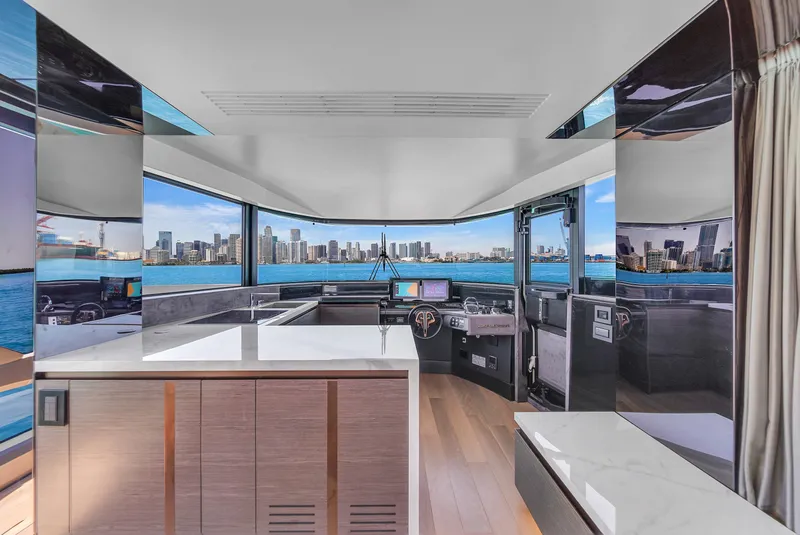 Slide: The Image of Luxurious 2021 Explorer 62 yacht interior with panoramic city skyline view. - 24