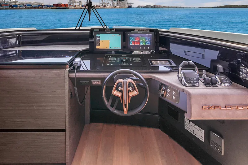 Slide: The Image of 2021 Explorer 62 yacht helm with modern navigation systems and ocean view. - 30