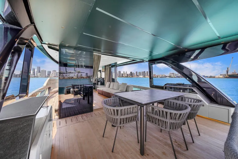 Slide: The Image of Luxurious 2021 Explorer 62 yacht interior with modern seating and ocean view. - 36