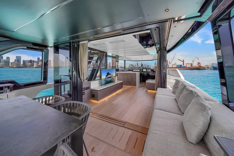 Slide: The Image of Luxurious 2021 Explorer 62 yacht interior with modern design and waterfront view. - 37