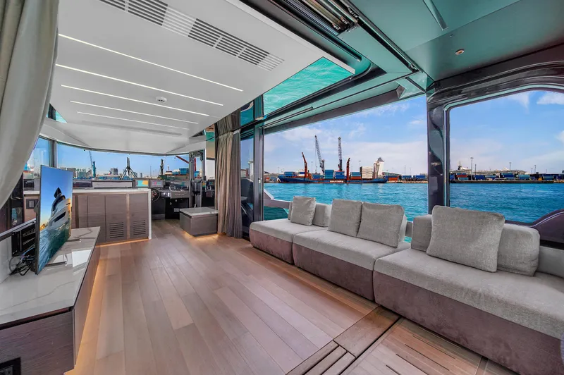 Slide: The Image of Luxurious interior of 2021 Explorer 62 yacht with panoramic ocean views and modern furnishings. - 38