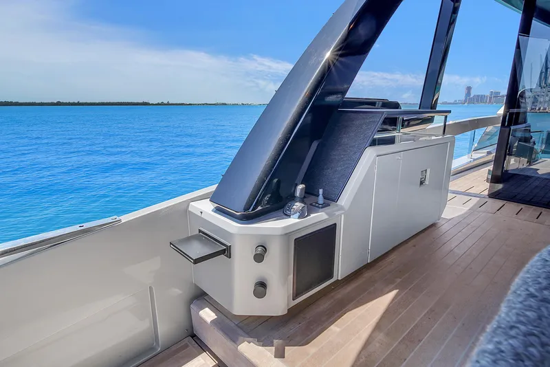 Slide: The Image of Luxurious 2021 Explorer 62 yacht deck with sleek design and ocean view. - 41