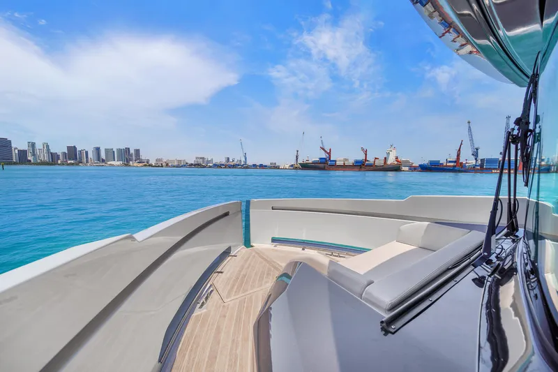 Slide: The Image of Luxury Explorer 62 yacht deck with city skyline and harbor view, 2021 model. - 42